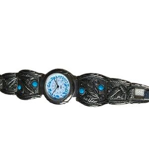 Silver/turquoise bracelet watch.